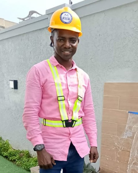 The owner of Mydazam Construct Ltd, on a finished job site in Lagos